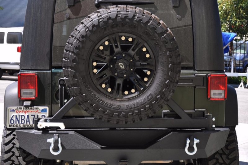 DV8 Offroad 07-18 Jeep Wrangler JK Rear Bumper w/ Tire Carrier & Tapered Bearing RBSTTB-01BR RBSTTB-01BR Photo - lifestyle view