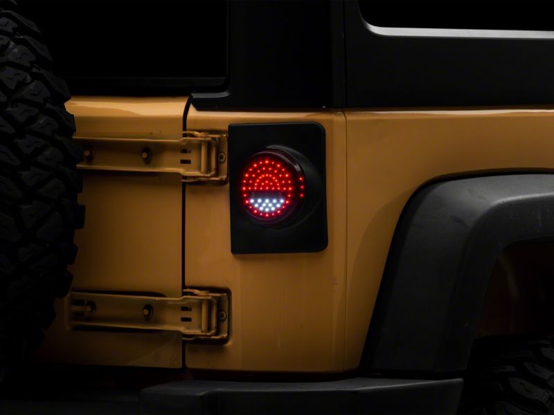 Raxiom 07-18 Jeep Wrangler JK Axial Series Halo LED Tail Lights- Blk Housing (Clear Lens) J164240 J164240 Photo - Close Up