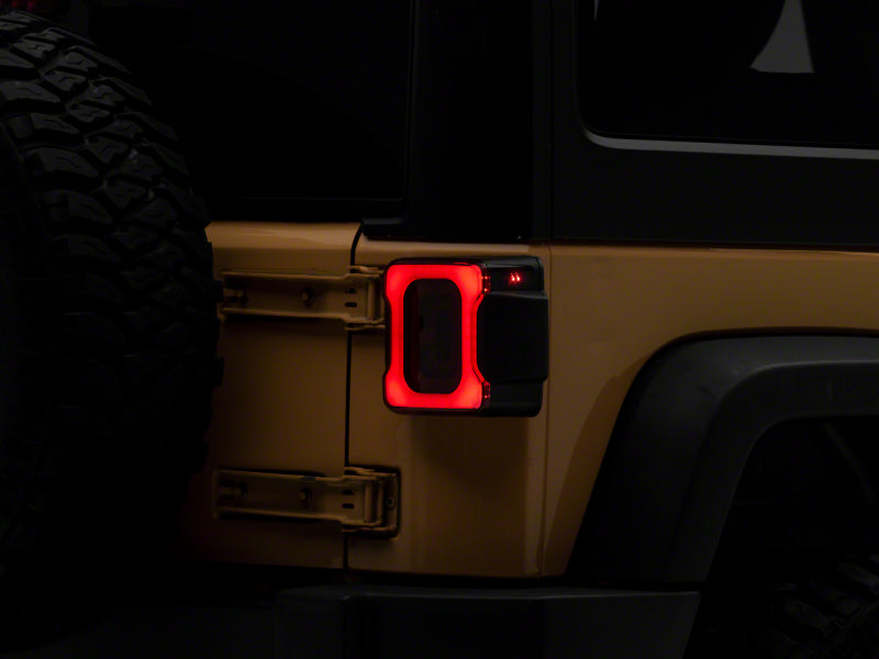 Raxiom 07-18 Jeep Wrangler JK Axial Series Carver LED Tail Lights- Blk Housing (Smoked Lens) J164241 J164241 Photo - Primary
