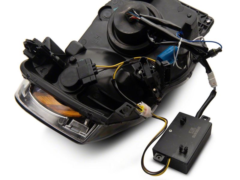 Raxiom 02-05 Dodge RAM 1500 LED Projector Headlights w/ SEQL LED Bar- Blk Housing (Clear Lens) R131478 R131478 Photo - Close Up