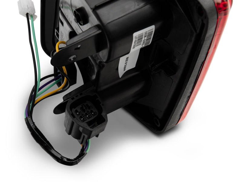 Raxiom 07-18 Jeep Wrangler JK JL Style LED Tail Lights- Black Housing - Red Lens J133626 J133626 Photo - Close Up