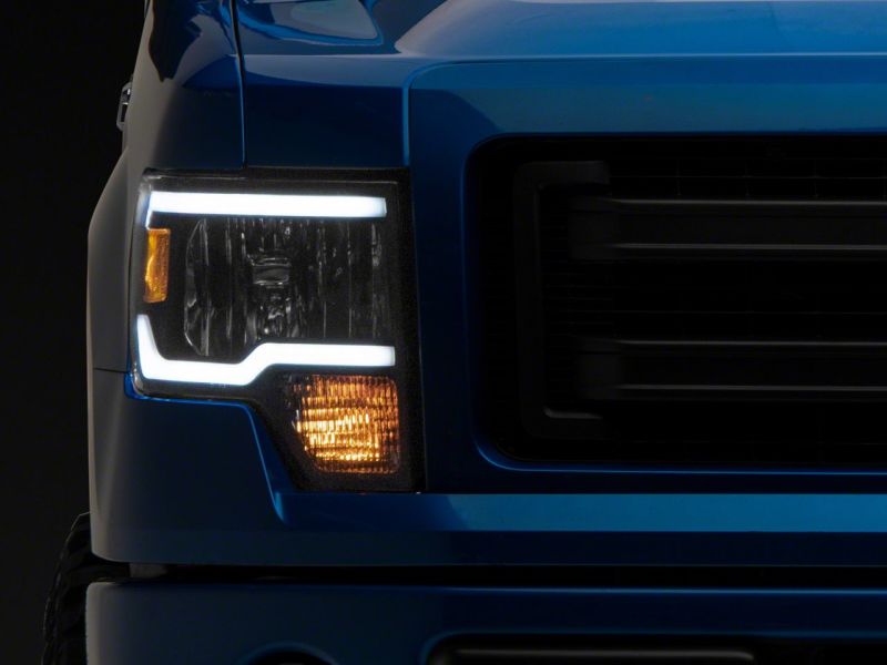 Raxiom 09-14 Ford F-150 Axial Series Headlights w/ LED Bar- Blk Housing (Clear Lens) T566367 T566367 Photo - Close Up