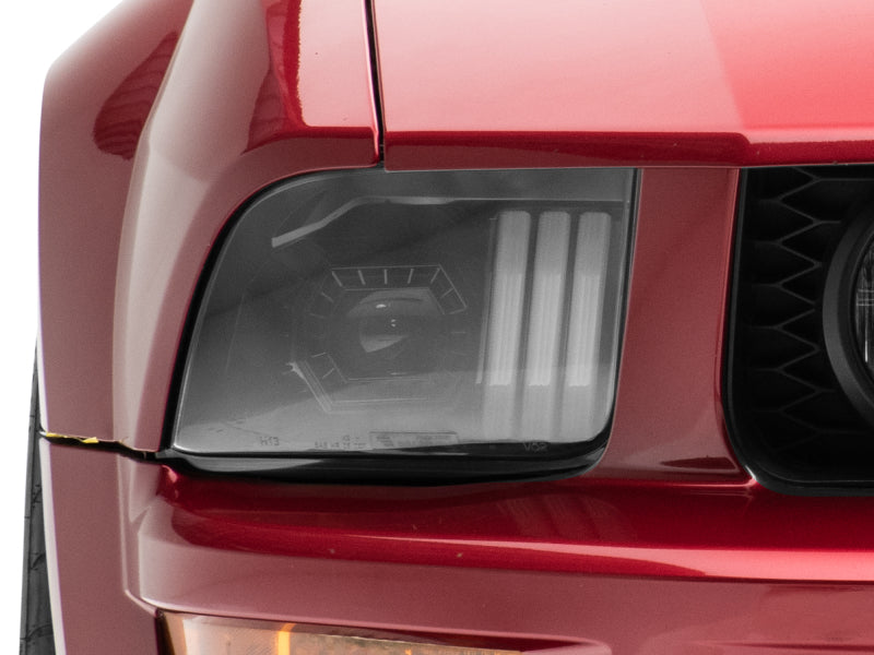 Raxiom 05-09 Ford Mustang w/ Halogen Prjctor Headlights- Black Housing (Clear Lens) (No GT500 ) 415794 415794 Photo - Close Up