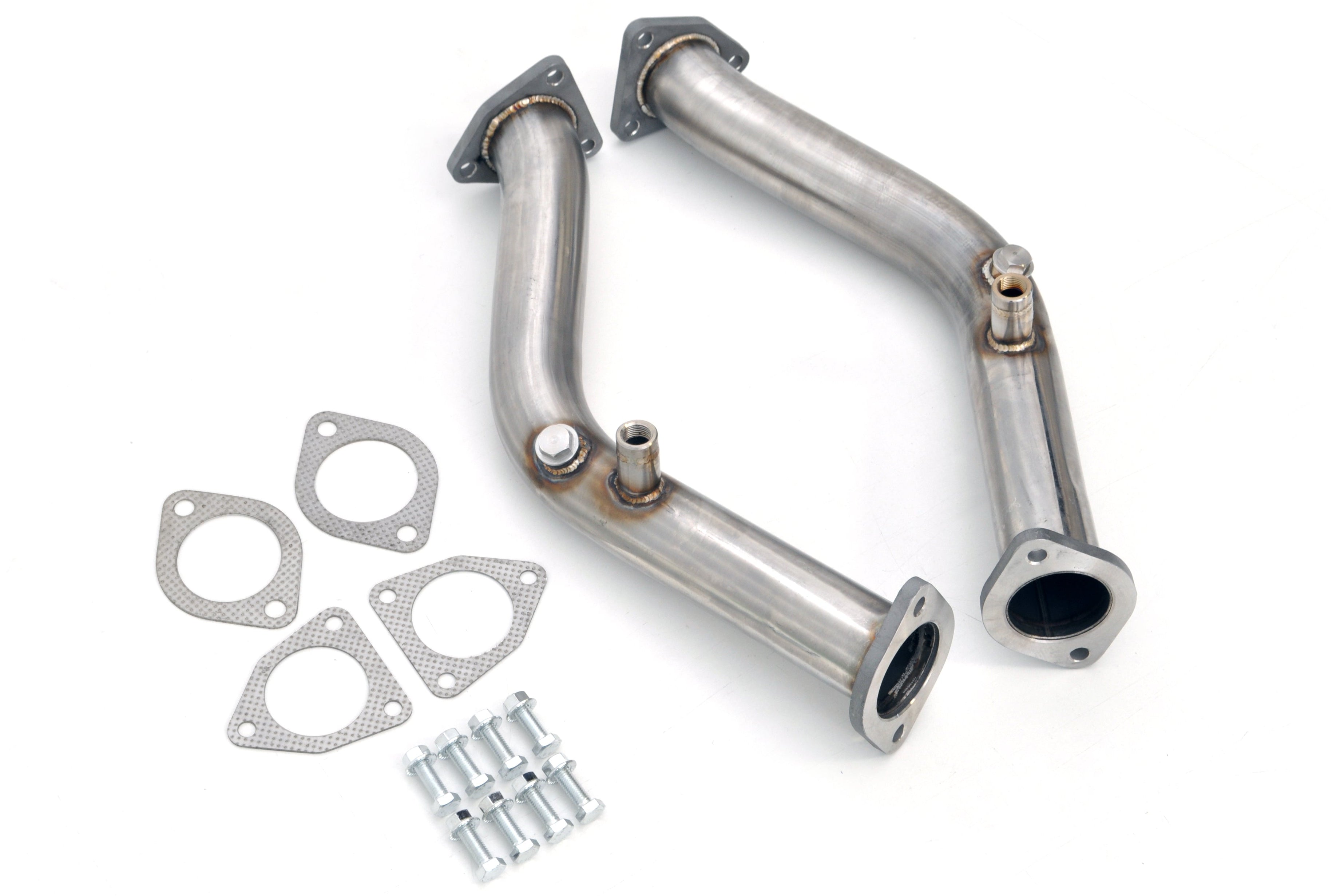 Metal exhaust pipes with gaskets and clamps on a white background