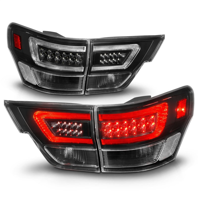 ANZO 11-13 Jeep Grand Cherokee LED Taillights w/ Lightbar Black Housing/Clear Lens 4pcs 311439 311439 Photo - Unmounted