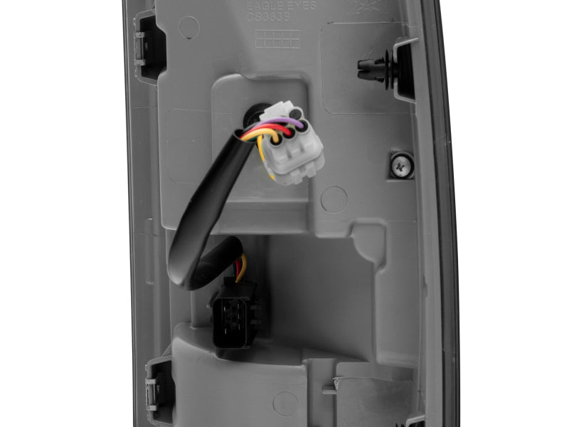 Raxiom 09-18 Dodge RAM 1500 LED Tail Lights- Black Housing (Smoked Lens) R110172 R110172 Photo - Close Up