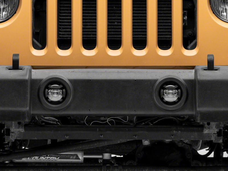 Raxiom 07-18 Jeep Wrangler JK Axial Series 4-In LED Fog Lights- Clear J167046 J167046 Photo - Close Up
