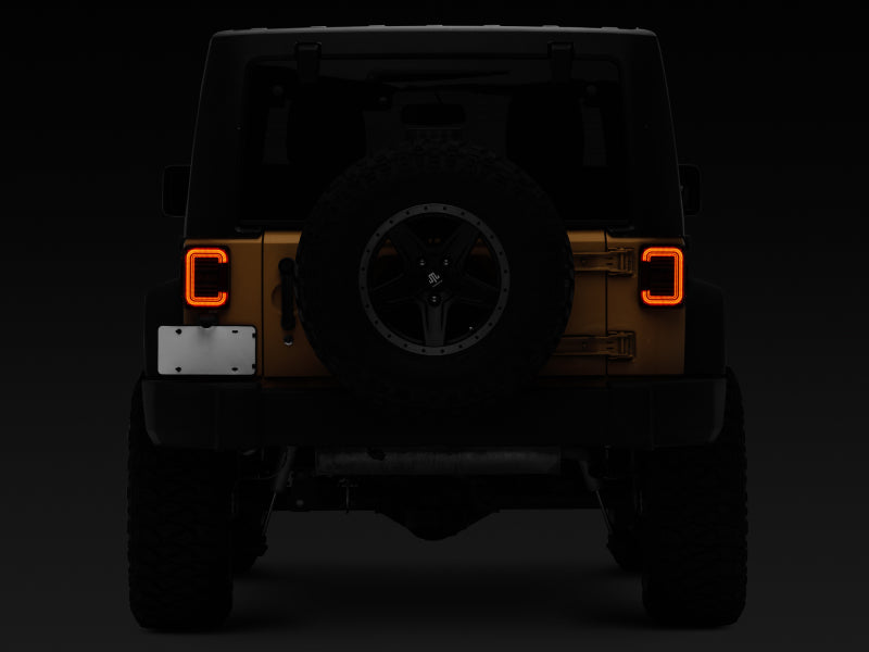 Raxiom 07-18 Jeep Wrangler JK Axial Series LED Halo Tail Lights- Black Housing (Dark Smoked Lens) J138358 J138358 Photo - Close Up
