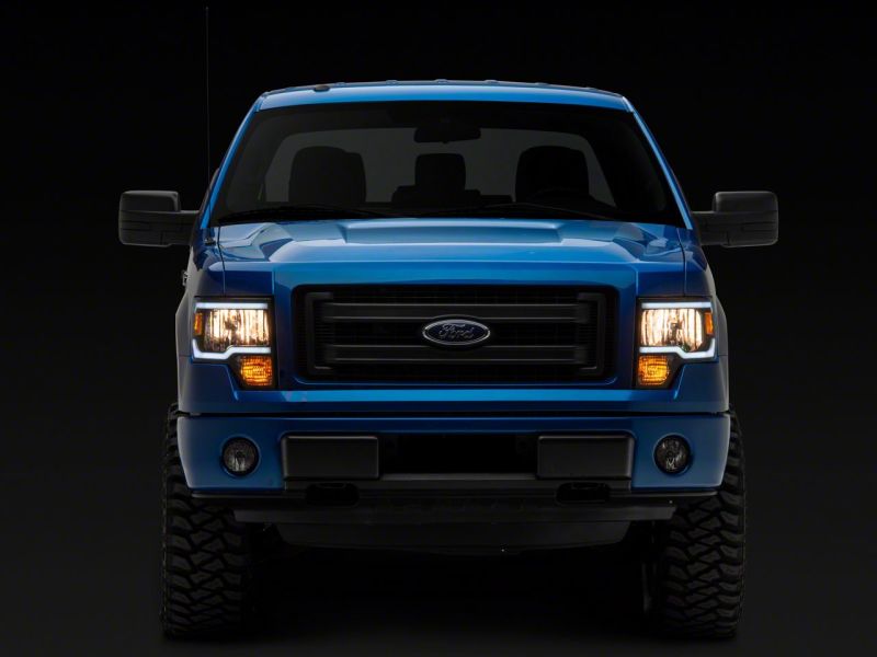 Raxiom 09-14 Ford F-150 Axial Series Headlight w/ SEQL LED Bar- Blk Housing (Clear Lens) T566368 T566368 Photo - Close Up