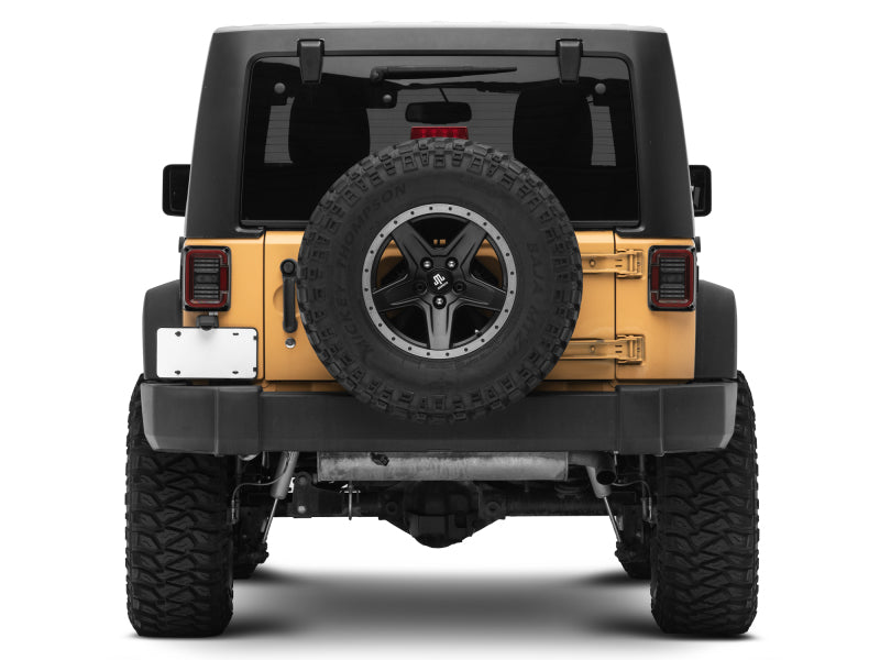 Raxiom 07-18 Jeep Wrangler JK Axial Series LED Halo Tail Lights- Black Housing (Dark Smoked Lens) J138358 J138358 Photo - Close Up