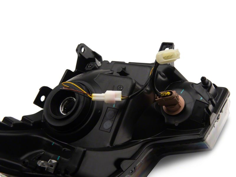 Raxiom 09-14 Ford F-150 Axial Series Headlight w/ SEQL LED Bar- Blk Housing (Clear Lens) T566368 T566368 Photo - Close Up