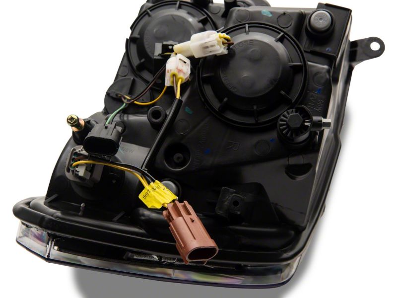 Raxiom 09-18 Dodge RAM 1500/2500/3500 Axial Headlights w/ SEQL LED Bar- Blk Housing (Clear Lens) R131482 R131482 Photo - Close Up