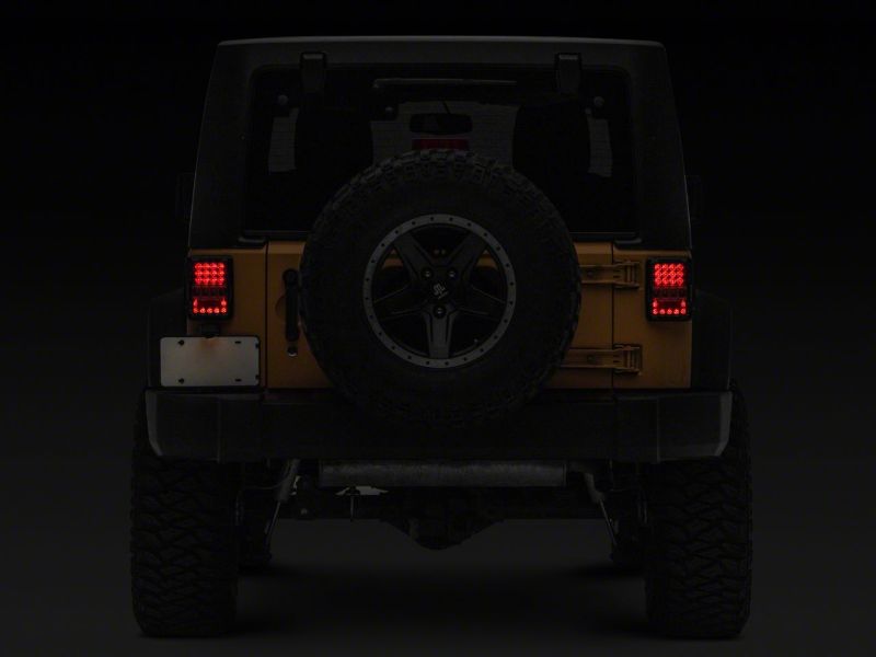 Raxiom 07-18 Jeep Wrangler JK Axial Series Lux LED Tail Lights- Blk Housing (Clear Lens) J141596 J141596 Photo - Close Up