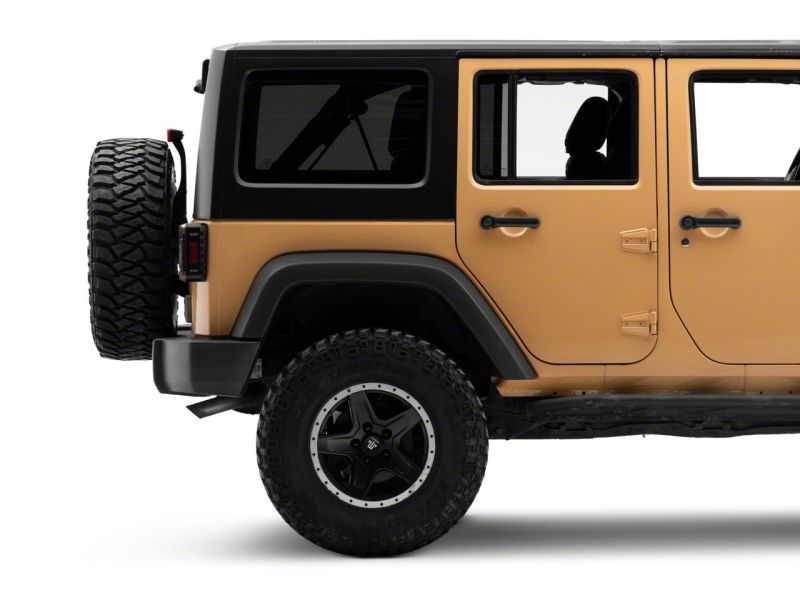 Raxiom 07-18 Jeep Wrangler JK Axial Series Trident LED Tail Lights- Blk Housing (Clear Lens) J173719 J173719 Photo - Close Up