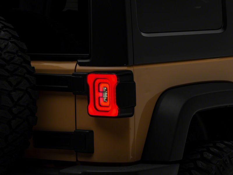 Raxiom 07-18 Jeep Wrangler JK Axial Series LED Tail Lights- Blk Housing (Smoked Lens) J183262 J183262 Photo - Close Up