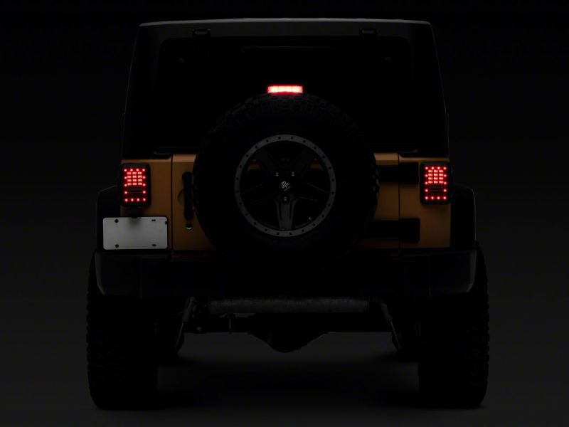Raxiom 07-18 Jeep Wrangler JK Axial Series LED Tail Lights- Blk Housing (Clear Lens) J141585 J141585 Photo - Close Up