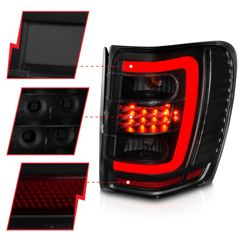 ANZO 1999-2004 Jeep Grand Cherokee LED Tail Lights w/ Light Bar Black Housing Smoke Lens 311395 311395 Photo - Unmounted