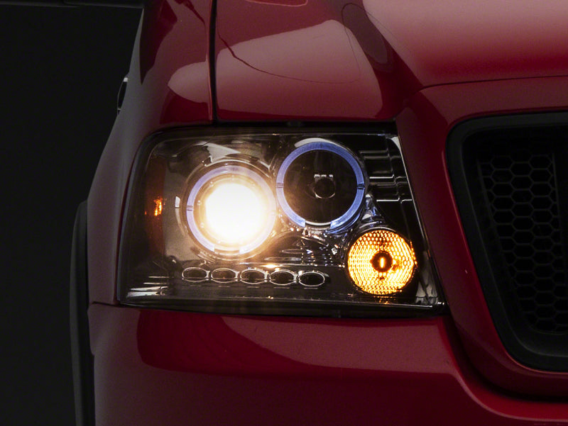 Raxiom 04-08 Ford F-150 Dual LED Halo Projector Headlights- Chrome Housing (Clear Lens) T542850 T542850 Photo - Primary