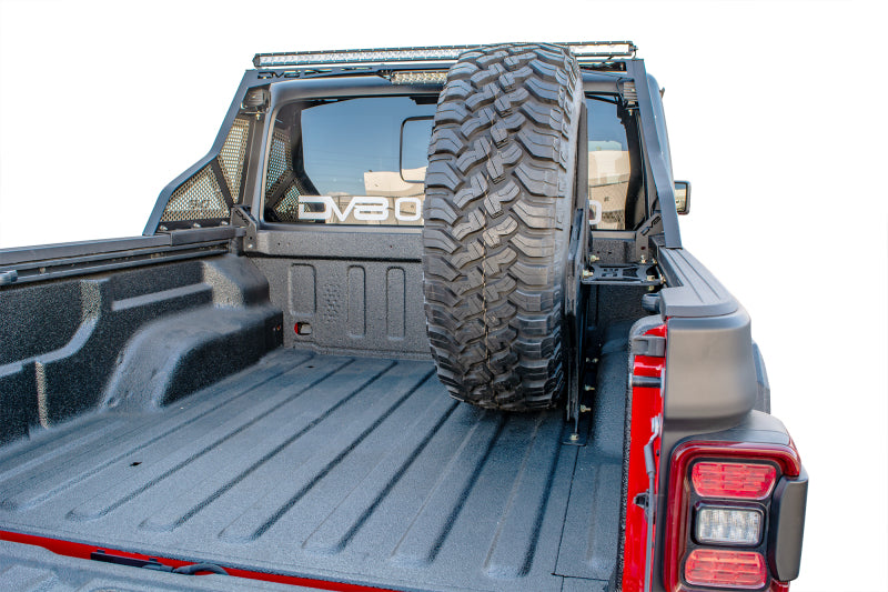 DV8 Offroad 2019+ Jeep Gladiator Universal Stand Up In-Bed Tire Carrier TCGL-02 TCGL-02 Photo - Mounted