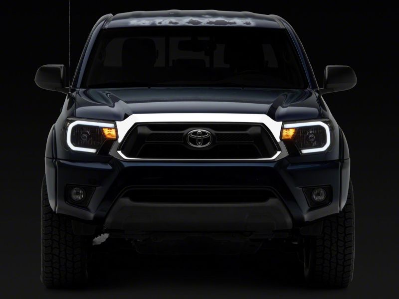 Raxiom 12-15 Toyota Tacoma Axial Series Headlights w/ LED Bar- Blk Housing (Clear Lens) TT21847 TT21847 Photo - Close Up