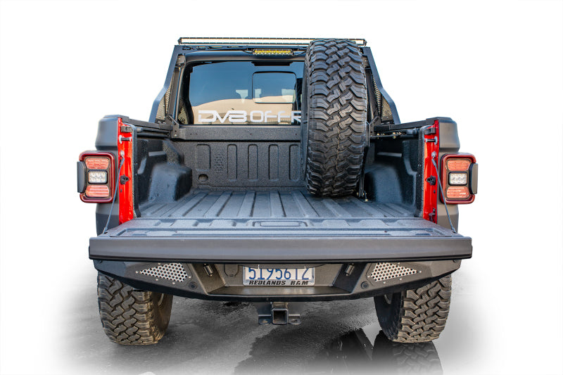 DV8 Offroad 2019+ Jeep Gladiator Universal Stand Up In-Bed Tire Carrier TCGL-02 TCGL-02 Photo - Mounted