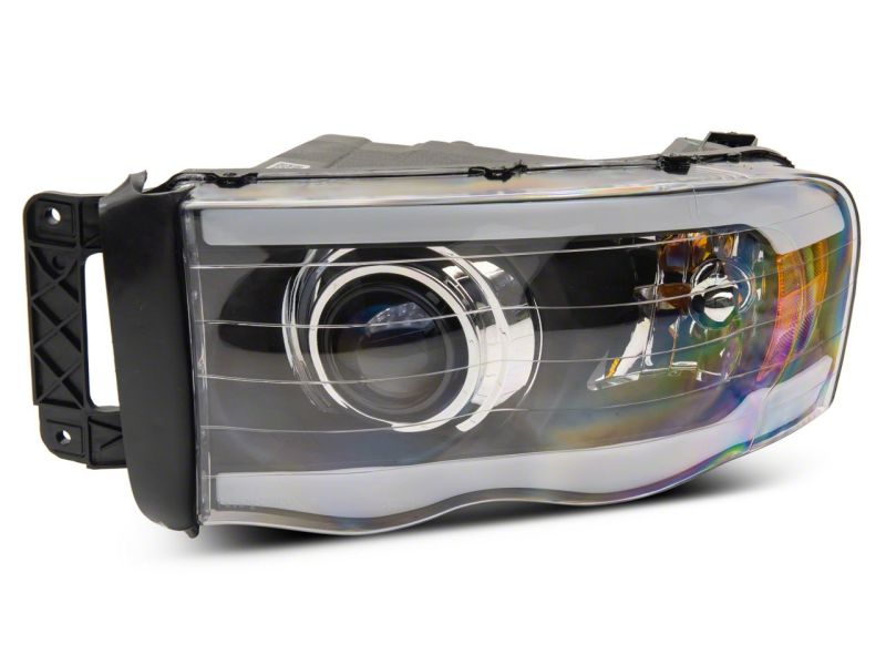 Raxiom 02-05 Dodge RAM 1500 LED Projector Headlights w/ SEQL LED Bar- Blk Housing (Clear Lens) R131478 R131478 Photo - Close Up