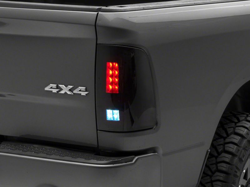 Raxiom 09-18 Dodge RAM 1500/2500/3500 Axial Series LED Tail Lights- Blk Housing (Smoked Lens) R131284 R131284 Photo - Close Up