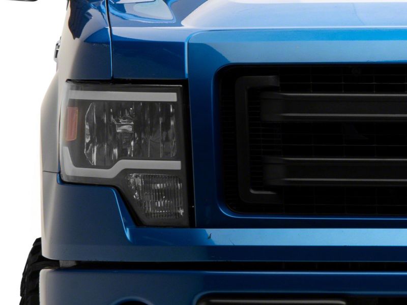 Raxiom 09-14 Ford F-150 Axial Series Headlights w/ LED Bar- Blk Housing (Clear Lens) T566367 T566367 Photo - Close Up
