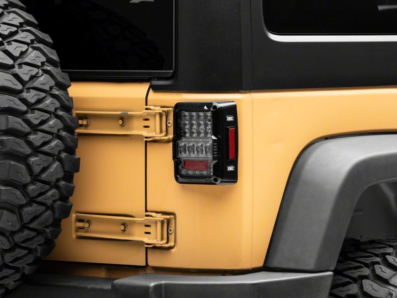 Raxiom 07-18 Jeep Wrangler JK Axial Series Lux LED Tail Lights- Blk Housing (Clear Lens) J141596 J141596 Photo - Close Up