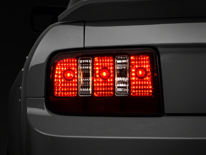 Raxiom 05-09 Ford Mustang Coyote Tail Lights- Blk Housing (Smoked Lens) 49117 49117 Photo - Primary