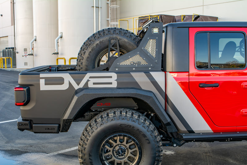 DV8 Offroad 2019+ Jeep Gladiator Universal Stand Up In-Bed Tire Carrier TCGL-02 TCGL-02 Photo - Mounted