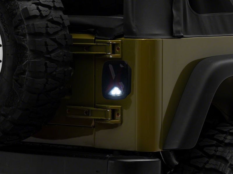 Raxiom 76-06 Jeep CJ7 Wrangler YJ & TJ Gladiator LED Tail Lights- Blk Housing (Smoked Lens) J177410 J177410 Photo - Close Up