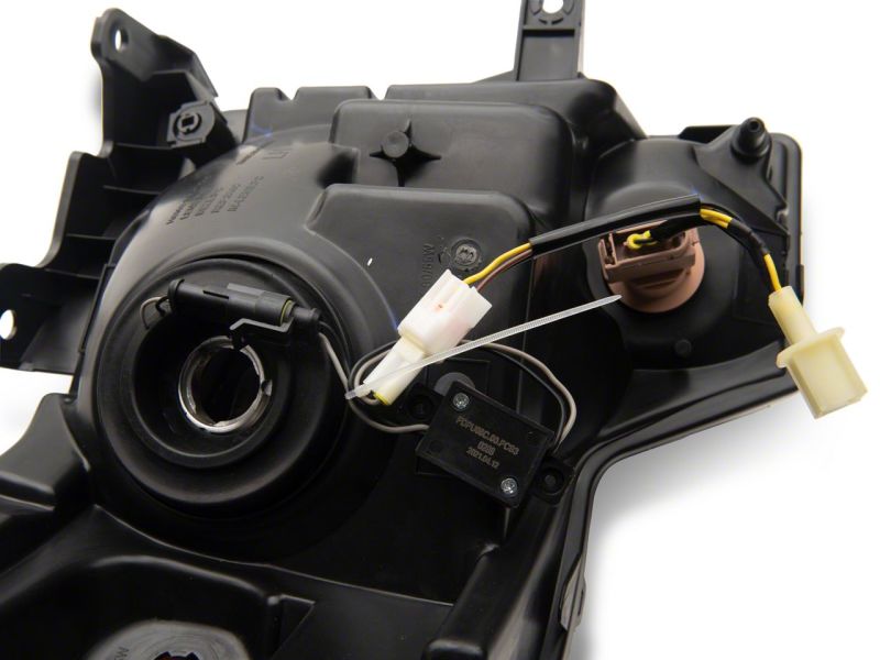 Raxiom 09-14 Ford F-150 Axial Series Headlights w/ LED Bar- Blk Housing (Clear Lens) T566367 T566367 Photo - Close Up