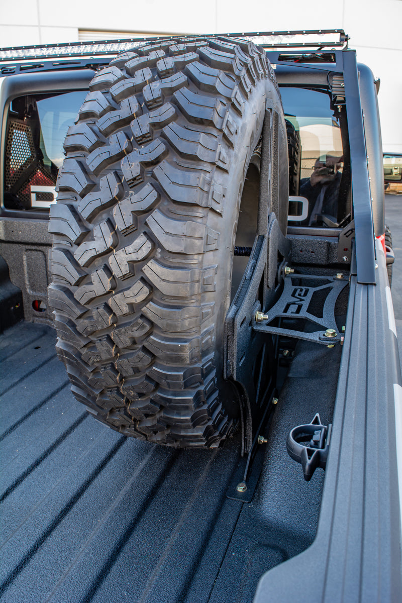 DV8 Offroad 2019+ Jeep Gladiator Universal Stand Up In-Bed Tire Carrier TCGL-02 TCGL-02 Photo - Mounted