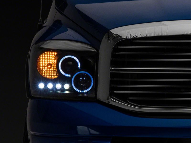 Raxiom 06-08 Dodge RAM 1500 LED Halo Projector Headlights- Blk Housing (Clear Lens) R110149 R110149 Photo - Close Up