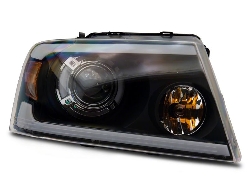 Raxiom 04-08 Ford F-150 Axial Series Projector Headlights w/ SEQL LED Bar- Blk Housing (Clear Lens) T566364 T566364 Photo - Close Up