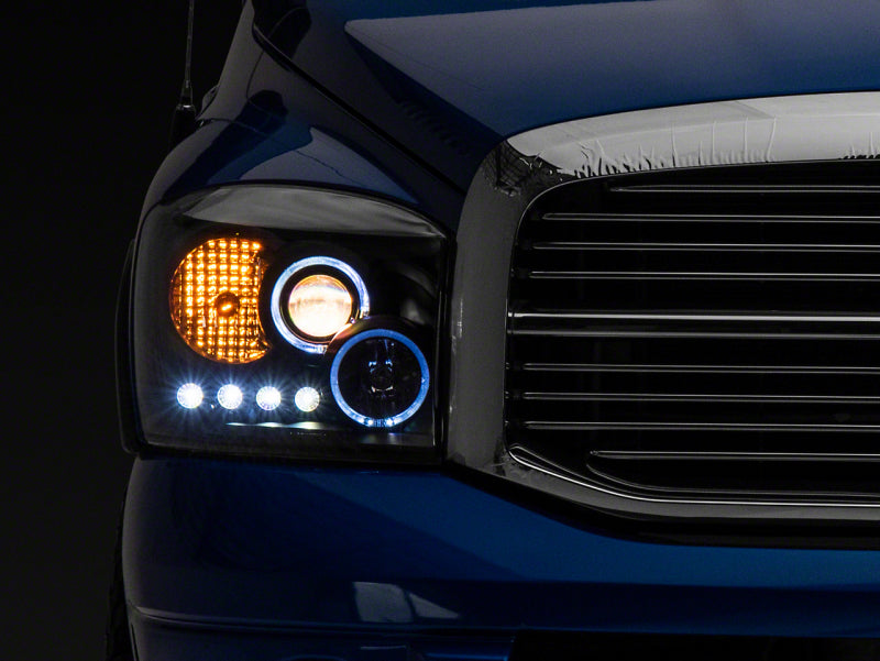 Raxiom 06-08 Dodge RAM 1500 LED Halo Projector Headlights- Blk Housing (Clear Lens) R110149 R110149 Photo - Primary