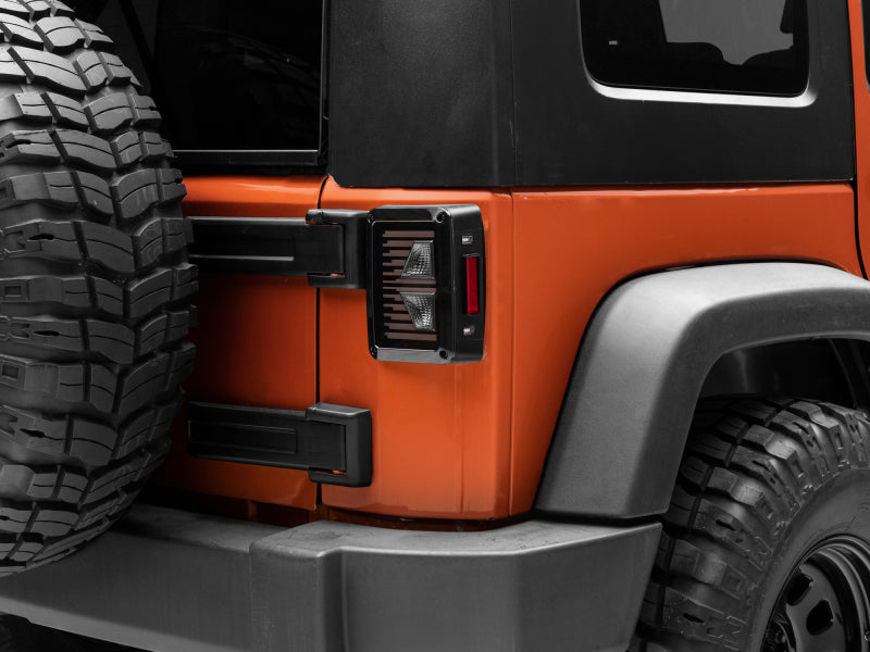 Raxiom 07-18 Jeep Wrangler JK Axial Series Vision LED Tail Lights- Black Housing (Smoked Lens) J130808 J130808 Photo - Close Up