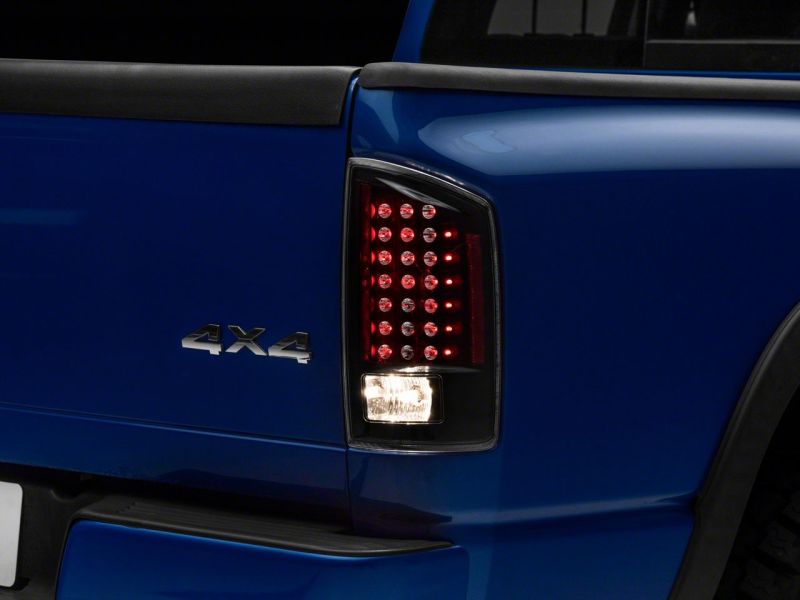 Raxiom 07-08 Dodge RAM 1500 LED Tail Lights- Blk Housing (Clear Lens) R110152 R110152 Photo - Close Up