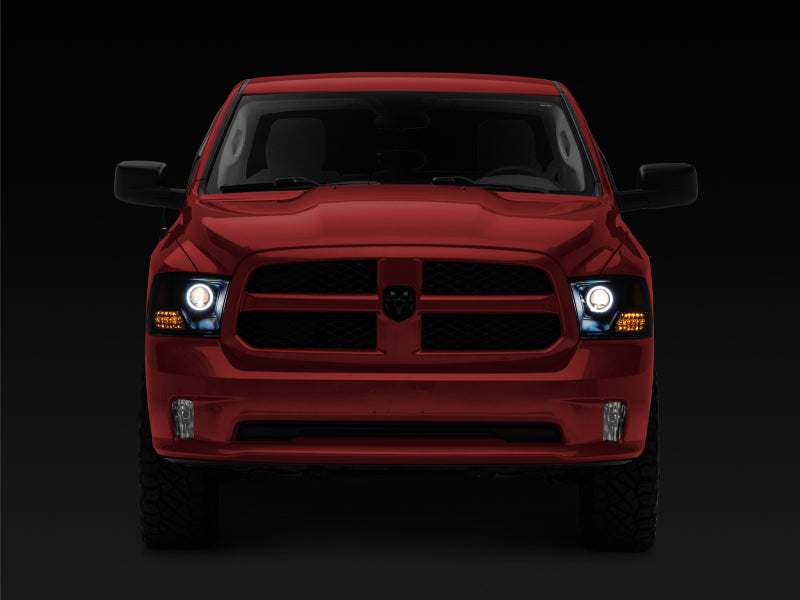 Raxiom 09-18 RAM 1500 Super White LED Halo Projector Headlights- Black Housing (Clear Lens) R110150 R110150 Photo - Close Up