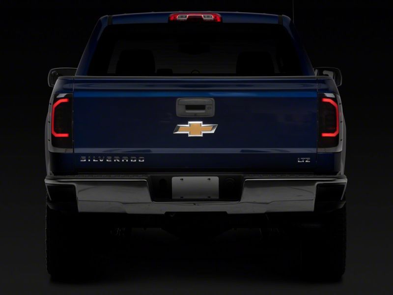 Raxiom 14-18 Chevrolet Silverado 1500 Axial Series LED Tail Lights- Blk Housing (Smoked Lens) S151298 S151298 Photo - Close Up