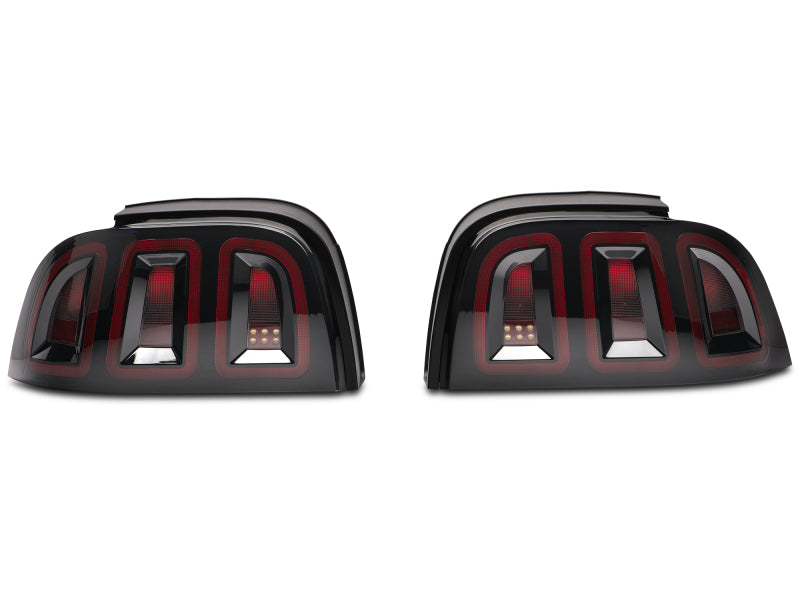 Raxiom 96-98 Ford Mustang Icon LED Tail Lights- Black Housing (Smoked Lens) 389876 389876 Photo - Close Up
