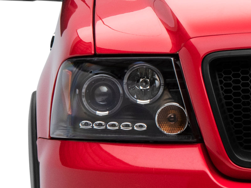 Raxiom 04-08 Ford F-150 Dual LED Halo Projector Headlights- Black Housing (Clear Lens) T542827 T542827 Photo - Close Up