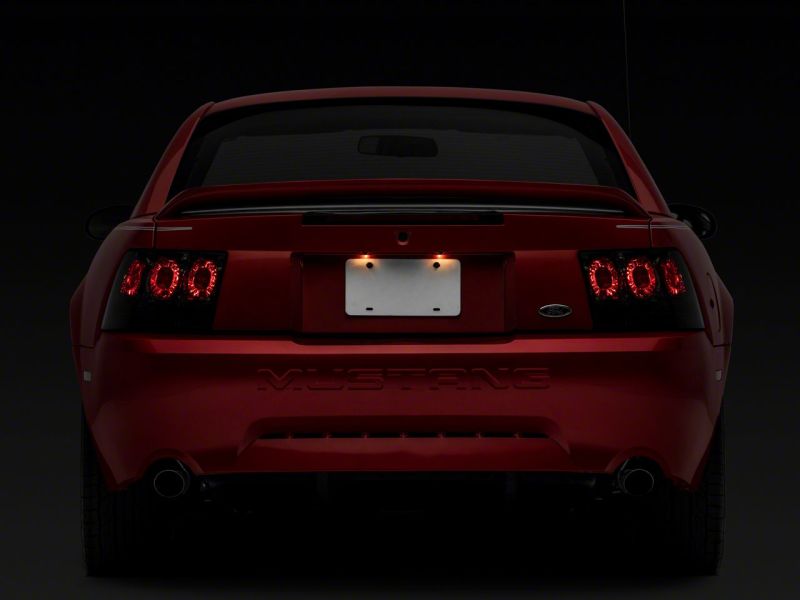 Raxiom 99-04 Ford Mustang Axial Series Altezza Style Tail Lights- Blk Housing (Smoked Lens) 413422 413422 Photo - Close Up