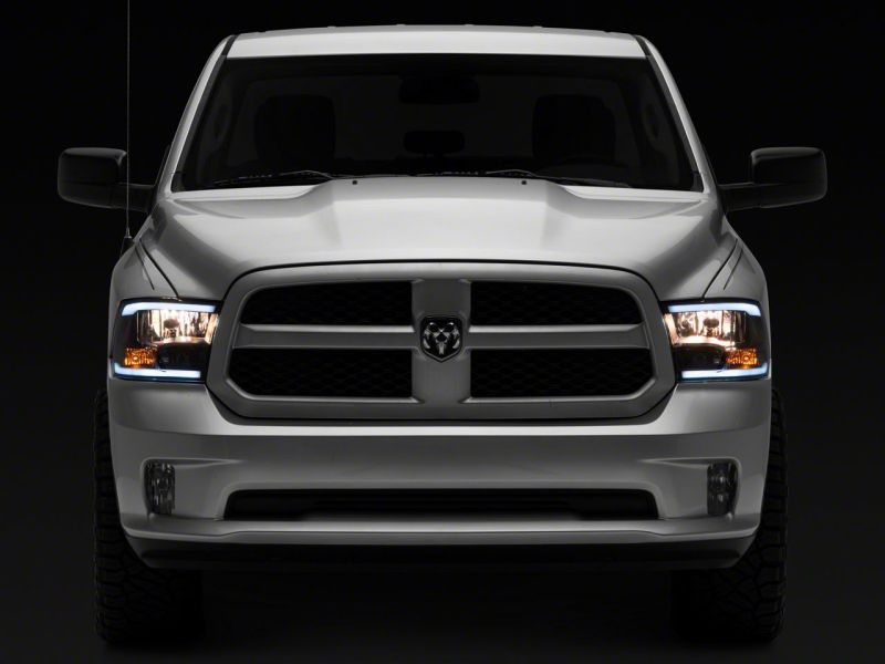 Raxiom 09-18 Dodge RAM 1500/2500/3500 Axial Headlights w/ SEQL LED Bar- Blk Housing (Clear Lens) R131482 R131482 Photo - Close Up