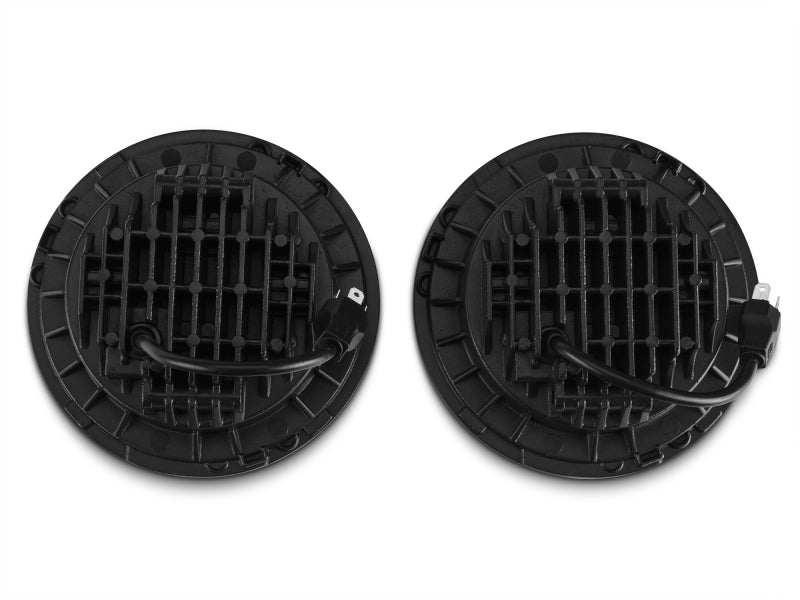 Raxiom 97-18 Jeep Wrangler TJ/JK Axial Series LED Daymaker Headlights- Black Housing (Clear Lens) J108042 J108042 Photo - Close Up