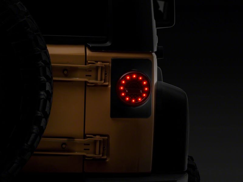 Raxiom 07-18 Jeep Wrangler JK Axial Series Halo LED Tail Lights- Blk Housing (Clear Lens) J164240 J164240 Photo - Close Up