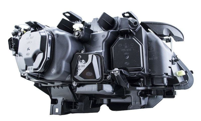 Hella 02-07 BMW 7 Series Bi-Xenon Headlight Left Clear Turn Signal 009044531