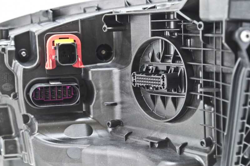 Hella Headlight Assembly 011869361