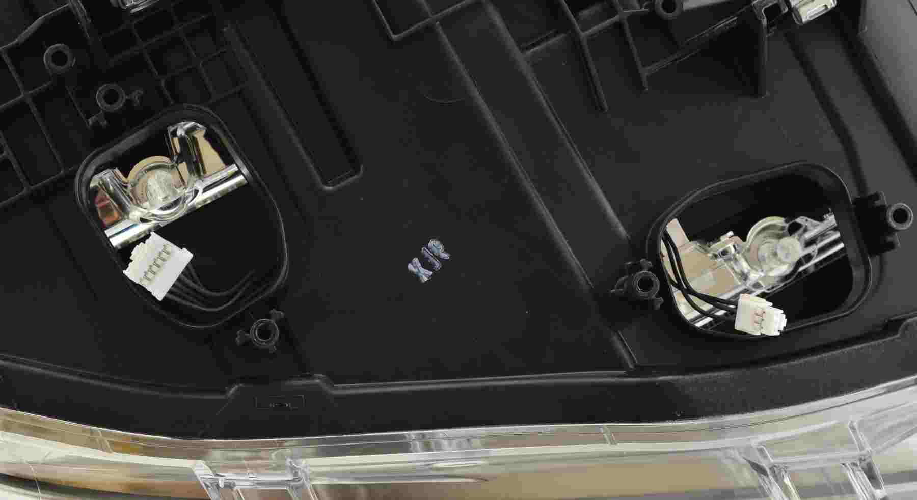 Hella Headlight Assembly 012102951